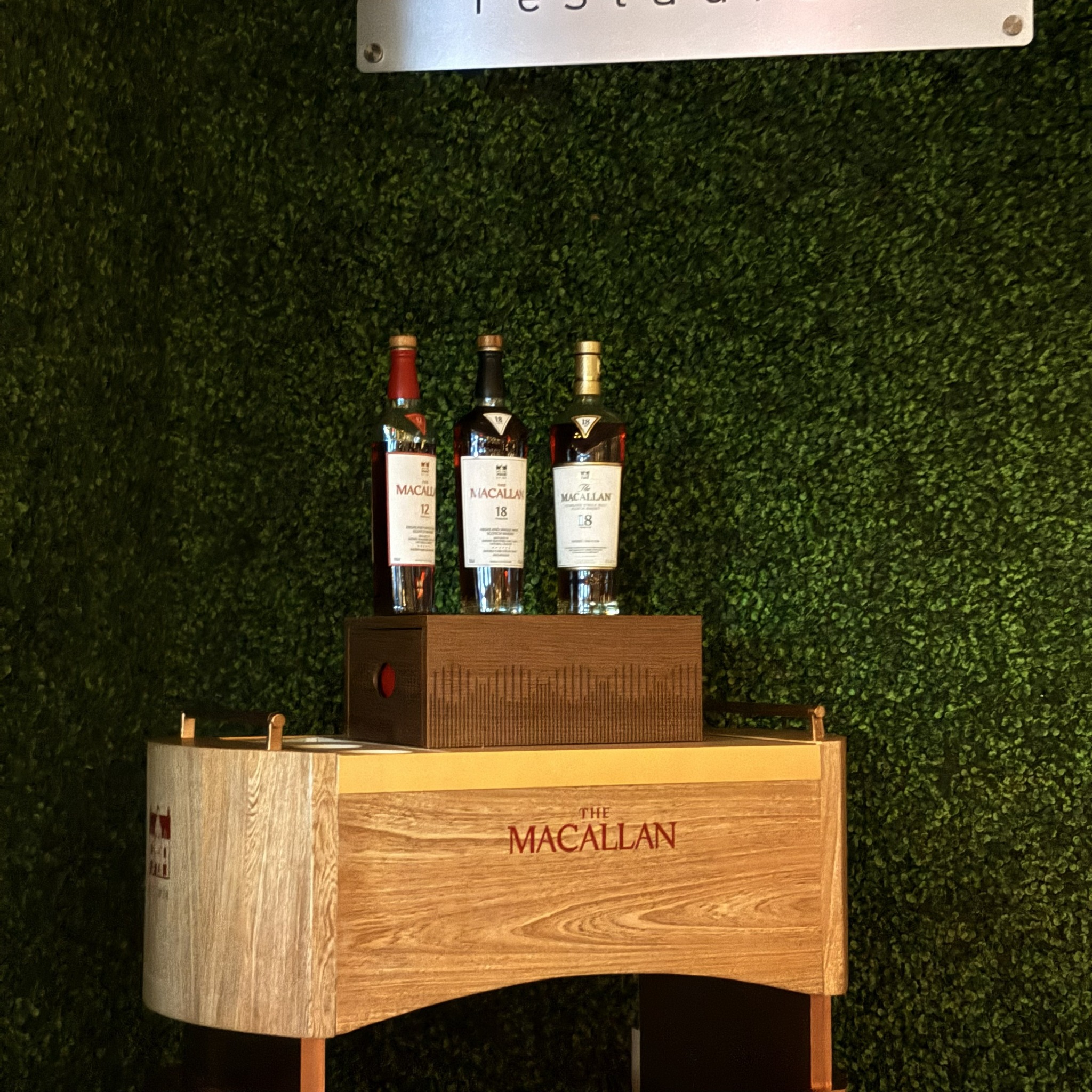 The Macallan 12 and 18 Year single malt Scotch whiskies on a wooden display at Forke Restaurant Las Vegas