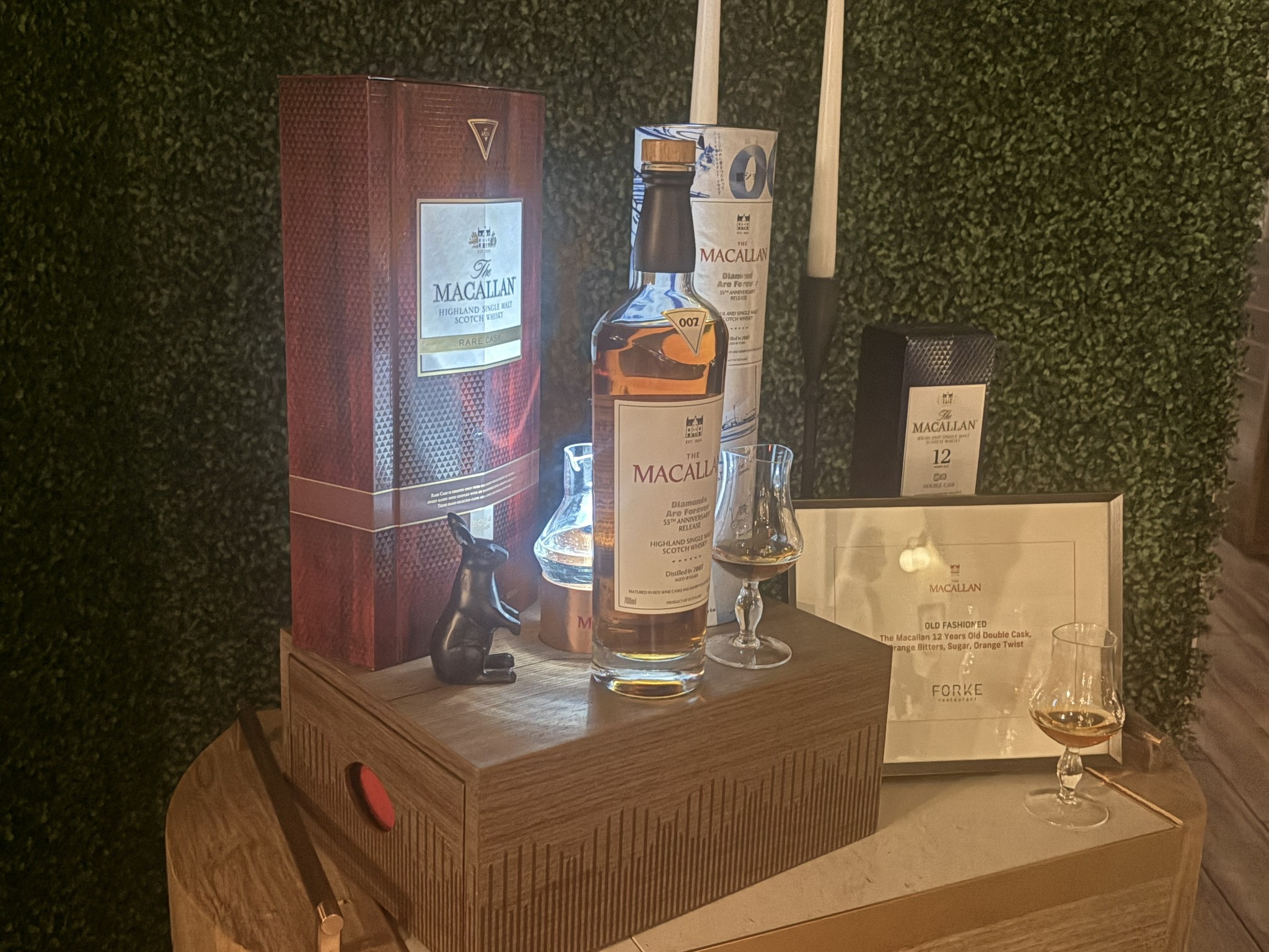 The Macallan Diamonds Are Forever 007 bottle and whisky glasses on display at Forke Restaurant in Las Vegas